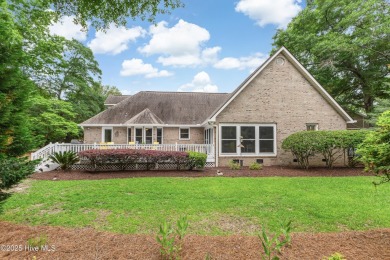 Tucked at the end of a cul-de-sac, this stunning brick home on Lockwood Folly Country Club in North Carolina - for sale on GolfHomes.com, golf home, golf lot