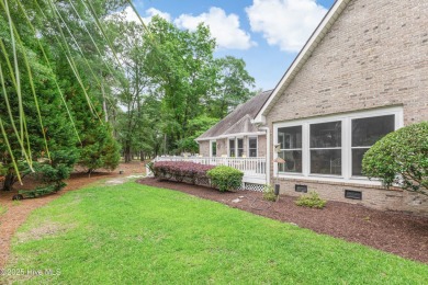 Tucked at the end of a cul-de-sac, this stunning brick home on Lockwood Folly Country Club in North Carolina - for sale on GolfHomes.com, golf home, golf lot