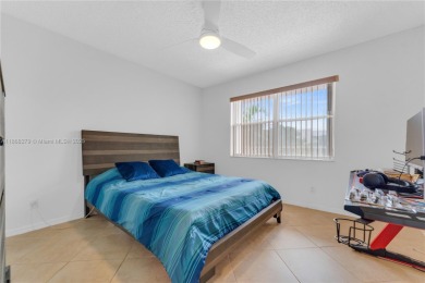 This beautifully renovated apartment seamlessly blends modern on Sunrise Lakes Phase IV Golf Course in Florida - for sale on GolfHomes.com, golf home, golf lot