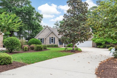 Tucked at the end of a cul-de-sac, this stunning brick home on Lockwood Folly Country Club in North Carolina - for sale on GolfHomes.com, golf home, golf lot