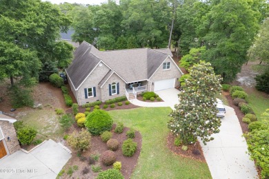 Tucked at the end of a cul-de-sac, this stunning brick home on Lockwood Folly Country Club in North Carolina - for sale on GolfHomes.com, golf home, golf lot