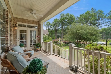 This Barker Canady craftsman-style custom built show home offers on Reserve Club At St James Plantation in North Carolina - for sale on GolfHomes.com, golf home, golf lot