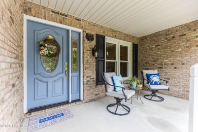 Tucked at the end of a cul-de-sac, this stunning brick home on Lockwood Folly Country Club in North Carolina - for sale on GolfHomes.com, golf home, golf lot