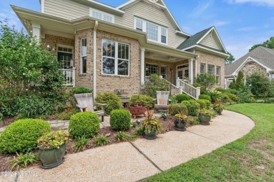 This Barker Canady craftsman-style custom built show home offers on Reserve Club At St James Plantation in North Carolina - for sale on GolfHomes.com, golf home, golf lot