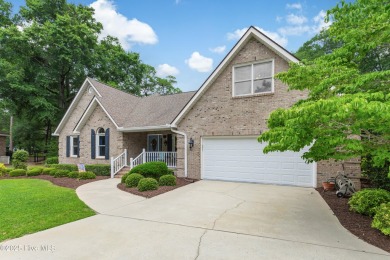 Tucked at the end of a cul-de-sac, this stunning brick home on Lockwood Folly Country Club in North Carolina - for sale on GolfHomes.com, golf home, golf lot
