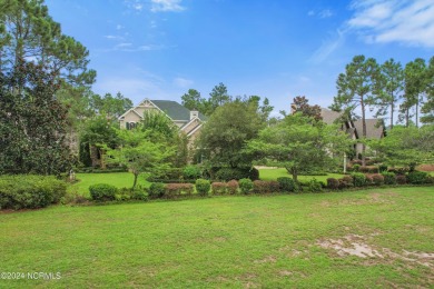 This Barker Canady craftsman-style custom built show home offers on Reserve Club At St James Plantation in North Carolina - for sale on GolfHomes.com, golf home, golf lot