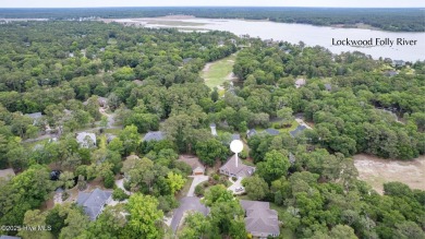 Tucked at the end of a cul-de-sac, this stunning brick home on Lockwood Folly Country Club in North Carolina - for sale on GolfHomes.com, golf home, golf lot