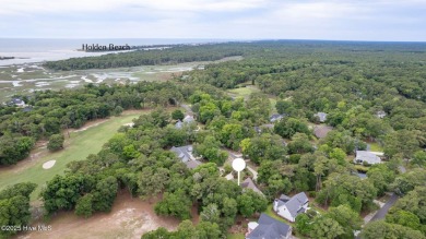 Tucked at the end of a cul-de-sac, this stunning brick home on Lockwood Folly Country Club in North Carolina - for sale on GolfHomes.com, golf home, golf lot
