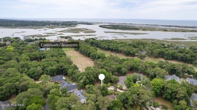 Tucked at the end of a cul-de-sac, this stunning brick home on Lockwood Folly Country Club in North Carolina - for sale on GolfHomes.com, golf home, golf lot