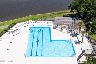 Tucked at the end of a cul-de-sac, this stunning brick home on Lockwood Folly Country Club in North Carolina - for sale on GolfHomes.com, golf home, golf lot