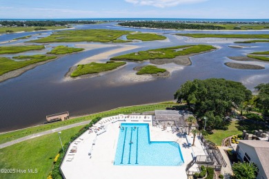 Tucked at the end of a cul-de-sac, this stunning brick home on Lockwood Folly Country Club in North Carolina - for sale on GolfHomes.com, golf home, golf lot