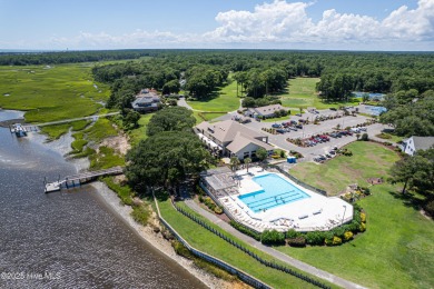 Tucked at the end of a cul-de-sac, this stunning brick home on Lockwood Folly Country Club in North Carolina - for sale on GolfHomes.com, golf home, golf lot
