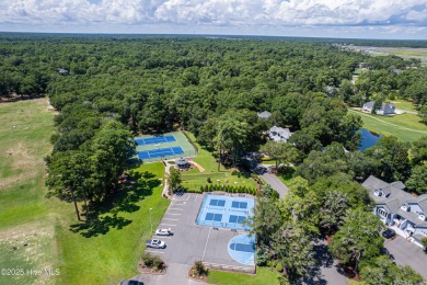 Tucked at the end of a cul-de-sac, this stunning brick home on Lockwood Folly Country Club in North Carolina - for sale on GolfHomes.com, golf home, golf lot