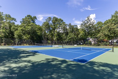 Tucked at the end of a cul-de-sac, this stunning brick home on Lockwood Folly Country Club in North Carolina - for sale on GolfHomes.com, golf home, golf lot