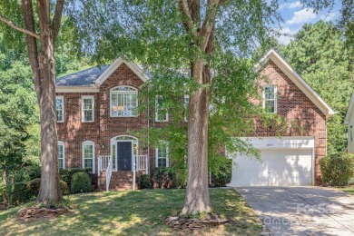 Step into this stunning 4-brf, 2.5-bath brick-front home on Northstone Country Club in North Carolina - for sale on GolfHomes.com, golf home, golf lot