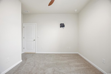 Step into this meticulously maintained 4-bedroom, 2-bath home on Palmetto Greens Golf and Country Club in South Carolina - for sale on GolfHomes.com, golf home, golf lot