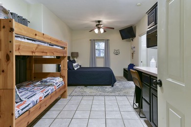 Step inside this 2-bedroom, 2.5-bath condo to find a on Ledgestone Country Club and Golf Course in Missouri - for sale on GolfHomes.com, golf home, golf lot