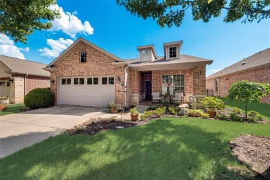 Nestled in the sought-after Frisco Lakes, this meticulously on Frisco Lakes Golf Course in Texas - for sale on GolfHomes.com, golf home, golf lot