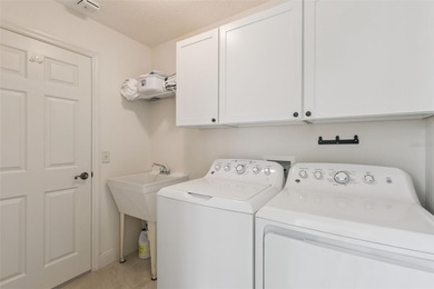 BRAND NEW ROOF 2026 | Golf Course Frontage | Birdcage Spa Home on Nancy Lopez Legacy Golf and Country Club in Florida - for sale on GolfHomes.com, golf home, golf lot