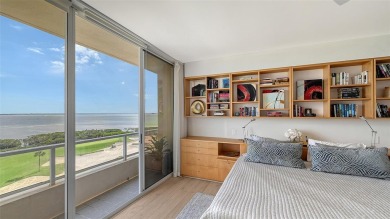 This rarely available 5th-floor Cayman residence in Grand Bay I on Longboat Key Golf Club Resort in Florida - for sale on GolfHomes.com, golf home, golf lot