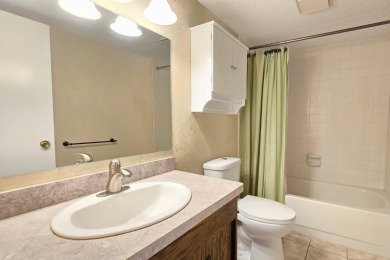 Light and neutral 2 bedroom, 2 bath 1200 sq. ft. second floor on Heather Ridge Golf Club in Illinois - for sale on GolfHomes.com, golf home, golf lot