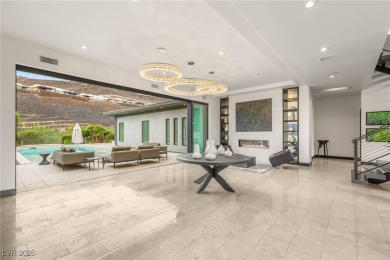 Tucked behind the gates of MacDonald Highlands, this exquisite on Dragon Ridge Country Club in Nevada - for sale on GolfHomes.com, golf home, golf lot