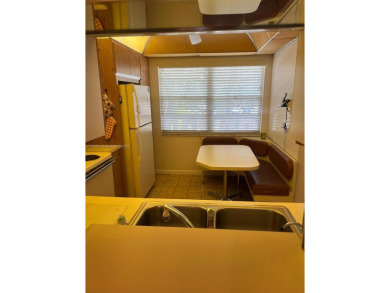 GATE COMMUNITY, 2 LARGE BEDROOMS WITH 2 FULL BATHS CONDO, SOLD on Wynmoor Golf Course in Florida - for sale on GolfHomes.com, golf home, golf lot