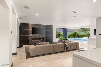 Tucked behind the gates of MacDonald Highlands, this exquisite on Dragon Ridge Country Club in Nevada - for sale on GolfHomes.com, golf home, golf lot