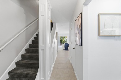 Welcome to Mediterranean Manor, a picturesque waterfront enclave on The Dunedin Country Club in Florida - for sale on GolfHomes.com, golf home, golf lot