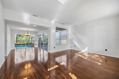 Welcome to this stunning pool home in the guard-gated Hunter's on Hunters Green Country Club in Florida - for sale on GolfHomes.com, golf home, golf lot