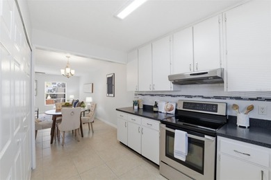 Welcome to Mediterranean Manor, a picturesque waterfront enclave on The Dunedin Country Club in Florida - for sale on GolfHomes.com, golf home, golf lot