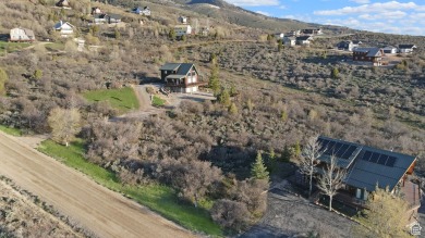 Nestled in the scenic community of Bear Lake West, this stunning on Bear Lake West Golf and Country Club in Idaho - for sale on GolfHomes.com, golf home, golf lot