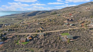 Nestled in the scenic community of Bear Lake West, this stunning on Bear Lake West Golf and Country Club in Idaho - for sale on GolfHomes.com, golf home, golf lot