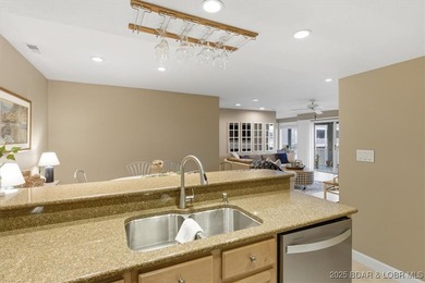 Escape to 488 Regatta Bay Circle #1A, where style and comfort on Seasons Ridge At Four Seasons in Missouri - for sale on GolfHomes.com, golf home, golf lot