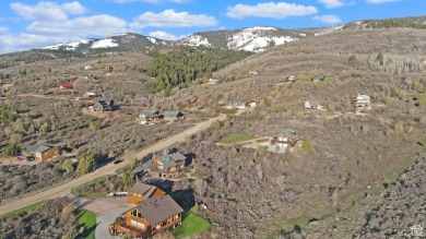 Nestled in the scenic community of Bear Lake West, this stunning on Bear Lake West Golf and Country Club in Idaho - for sale on GolfHomes.com, golf home, golf lot