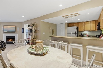 Escape to 488 Regatta Bay Circle #1A, where style and comfort on Seasons Ridge At Four Seasons in Missouri - for sale on GolfHomes.com, golf home, golf lot