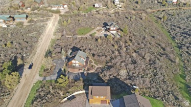 Nestled in the scenic community of Bear Lake West, this stunning on Bear Lake West Golf and Country Club in Idaho - for sale on GolfHomes.com, golf home, golf lot