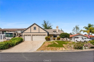 Welcome to this open and bright single-level home in Canyon Lake on Canyon Lake Country Club in California - for sale on GolfHomes.com, golf home, golf lot