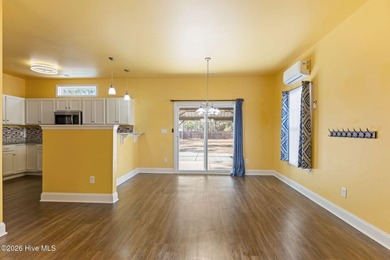 Enjoy life indoors & outdoors in this turnkey 4 bedroom 2 1/2 on The Lakes Country Club in North Carolina - for sale on GolfHomes.com, golf home, golf lot