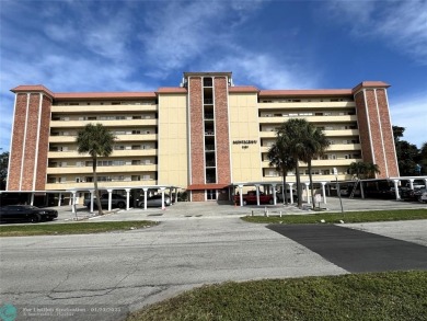 Cozy 2-bedroom, 2-bathroom apartment in a unique location close on Crystal Lake Country Club in Florida - for sale on GolfHomes.com, golf home, golf lot