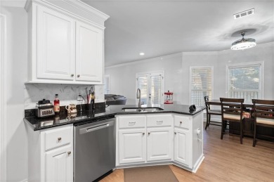 Welcome to this beautifully remodeled 5-bedroom, 3-bathroom home on Magnolia Grove Golf Club in Alabama - for sale on GolfHomes.com, golf home, golf lot