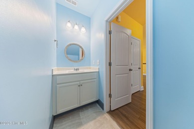 Enjoy life indoors & outdoors in this turnkey 4 bedroom 2 1/2 on The Lakes Country Club in North Carolina - for sale on GolfHomes.com, golf home, golf lot