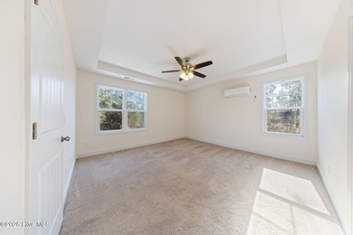 Enjoy life indoors & outdoors in this turnkey 4 bedroom 2 1/2 on The Lakes Country Club in North Carolina - for sale on GolfHomes.com, golf home, golf lot