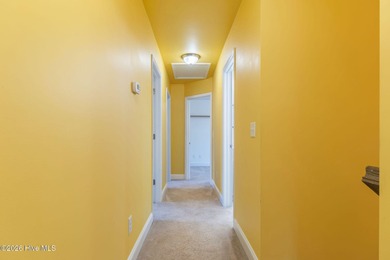 Enjoy life indoors & outdoors in this turnkey 4 bedroom 2 1/2 on The Lakes Country Club in North Carolina - for sale on GolfHomes.com, golf home, golf lot