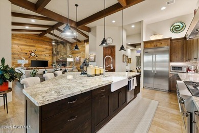 Views, golf, and luxury. Framed by iconic Granite Mountain views on Talking Rock Golf Club in Arizona - for sale on GolfHomes.com, golf home, golf lot