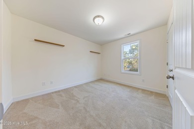 Enjoy life indoors & outdoors in this turnkey 4 bedroom 2 1/2 on The Lakes Country Club in North Carolina - for sale on GolfHomes.com, golf home, golf lot