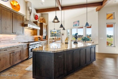 Views, golf, and luxury. Framed by iconic Granite Mountain views on Talking Rock Golf Club in Arizona - for sale on GolfHomes.com, golf home, golf lot