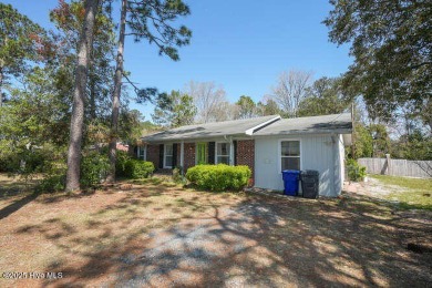 One of a kind classic! This brick home was built strong & has on The Lakes Country Club in North Carolina - for sale on GolfHomes.com, golf home, golf lot