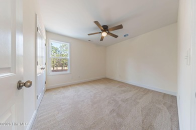 Enjoy life indoors & outdoors in this turnkey 4 bedroom 2 1/2 on The Lakes Country Club in North Carolina - for sale on GolfHomes.com, golf home, golf lot