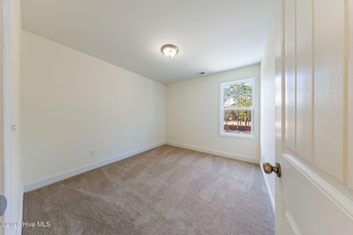 Enjoy life indoors & outdoors in this turnkey 4 bedroom 2 1/2 on The Lakes Country Club in North Carolina - for sale on GolfHomes.com, golf home, golf lot